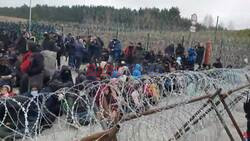 Videos appear to show migrants gathering at the Belarus-Poland border