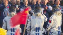 Chinese astronauts wave farewell ahead of Shenzhou-17 launch - AFP