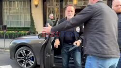 Hollywood actor Arnold Schwarzenegger and his entourage pictured arriving back to his hotel in London.