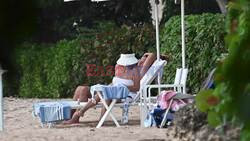 *EXCLUSIVE* The 90-year old British Actress Joan Collins and her husband Percy Gibson lap up the Caribbean sunshine spotted chilling out at the beach on their holidays in Western Barbados.