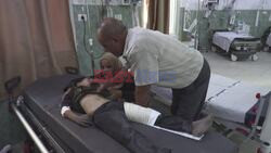Injured children receive care at Gaza hospital after Israeli strikes - AFP