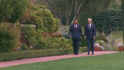 Biden and Xi walk together after their meeting, military links to restart - AFP