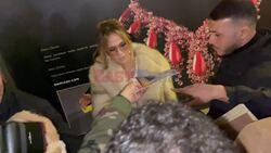 Jennifer Lopez signing autographs as she exits Schiaparelli’s after-show cocktail in Paris