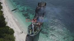 Smoke billows from Philippine ferry after fire, rescuers at scene - AFP