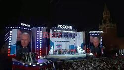 Putin speaks at lavish Moscow concert marking Crimea annexation anniversary - AFP