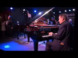 *EXCLUSIVE* Jools Holland invites Pianist Theophilus Martins to perform at Boisdale Restaurant in London.
