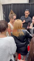 Miley Cyrus radiates elegance in white dress with open neckline during Paris visit