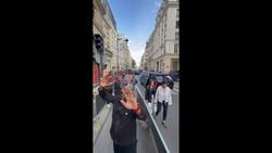 CLIP 2/2: Travis Scott spotted arriving in Paris while hiding his face from cameras