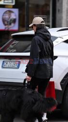 Nicole Minetti tries to go unnoticed wearing a Cipriani designer hat.