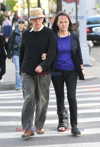 Woody Allen and wife Soon-Yi Previn hold hands 