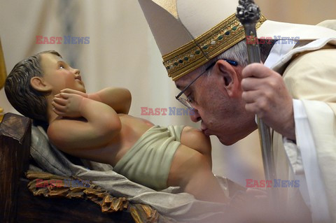 Pope Francis burns incense for a statue of the Virgin Mary