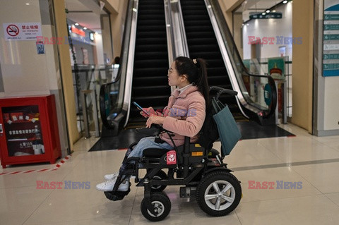 Ciężkie życie osób na wózkach w Chinach - AFP