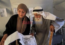 Starszy Palestyńczyk utrwala wojnę w obrazach